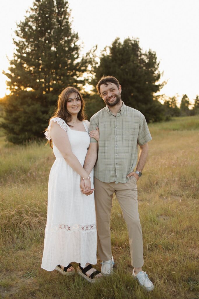 couple posing for the camera during their photoshoot