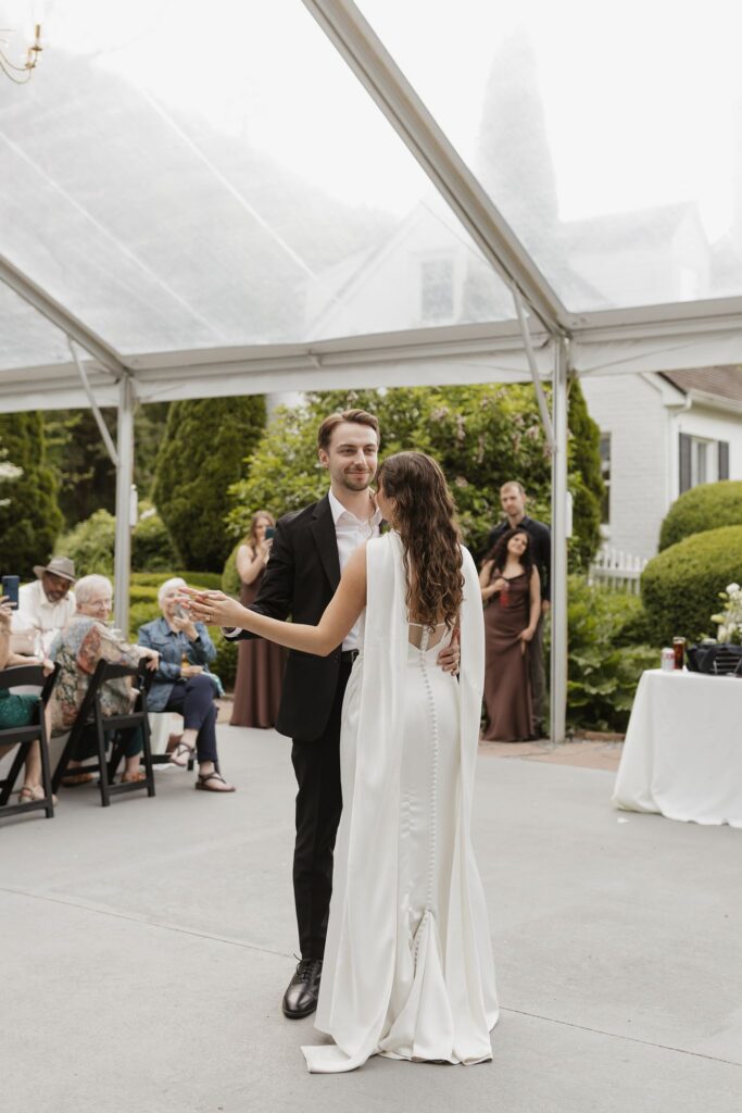 Portrait of the newly married couple dancing at their wedding reception