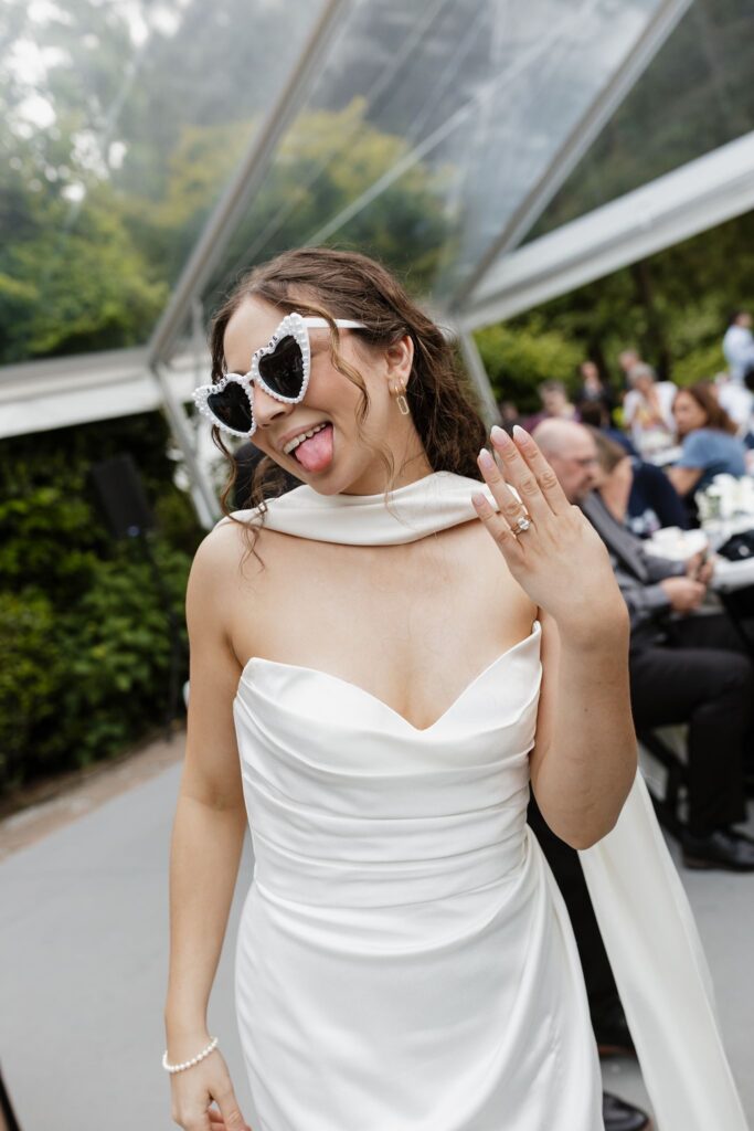 fun picture of the bride dancing at her wedding reception party