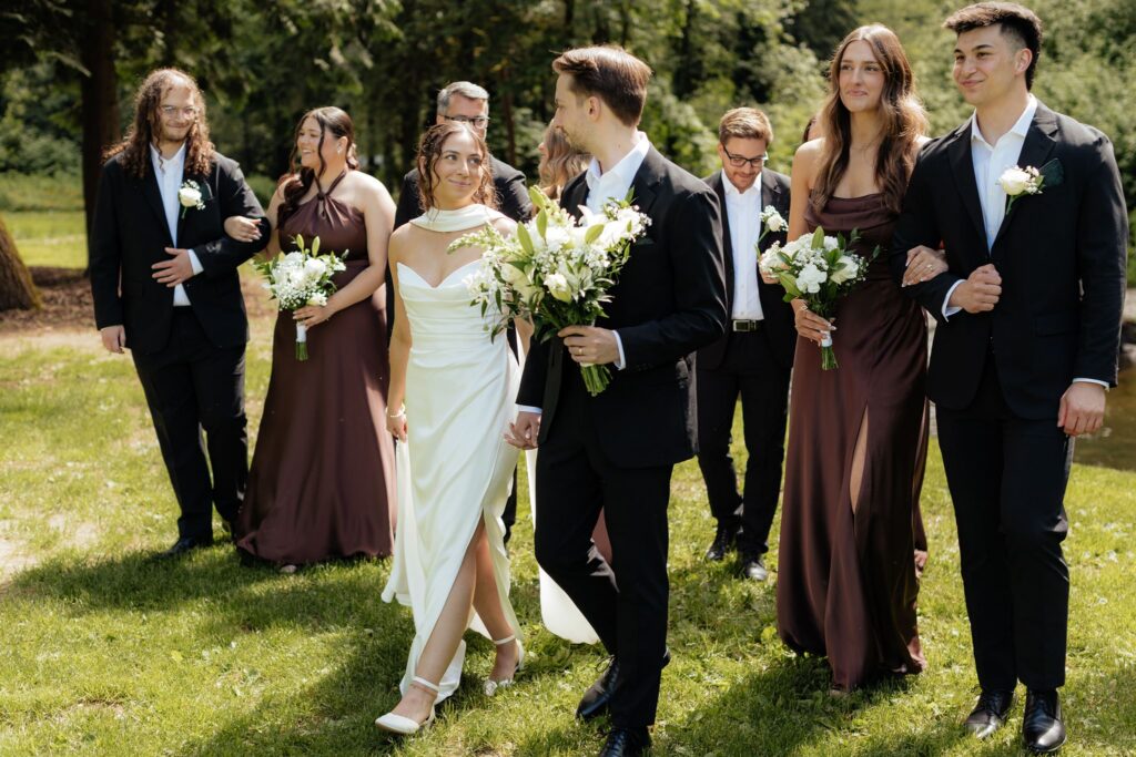golden hour portraits of the bride and groom with their bridal parties