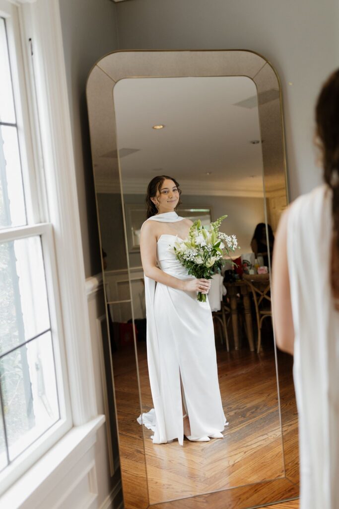 stunning picture of the bride before heading to the first look with the groom