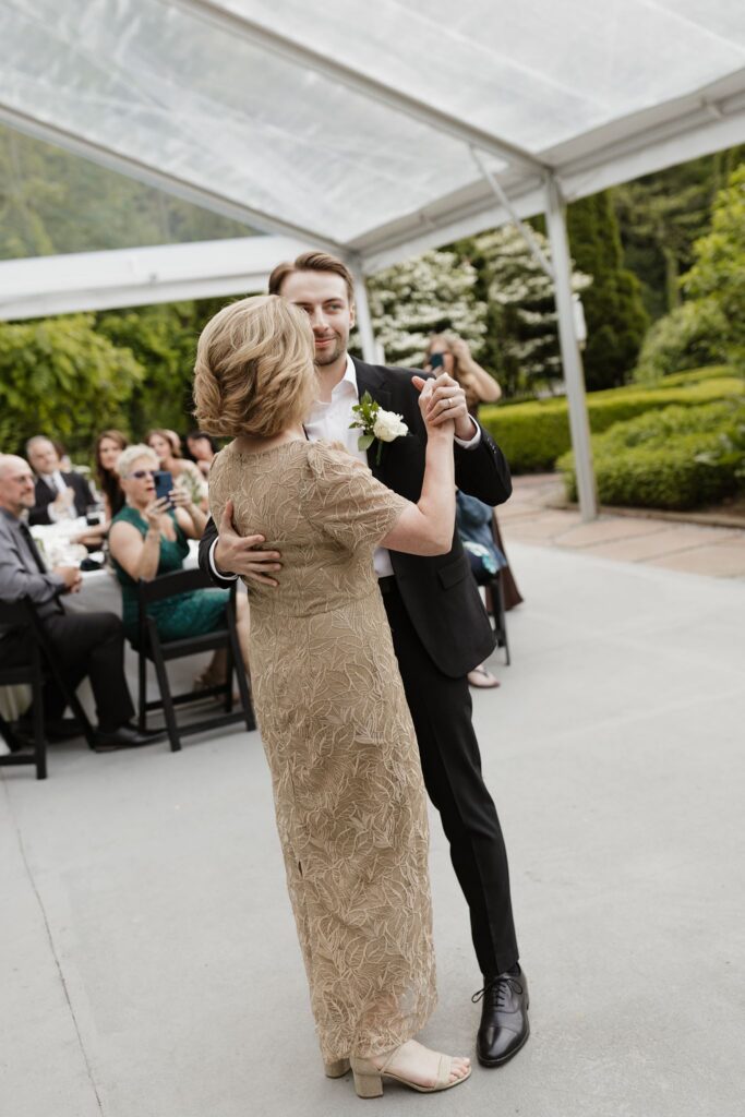 Picture of the groom dancing with his mom
