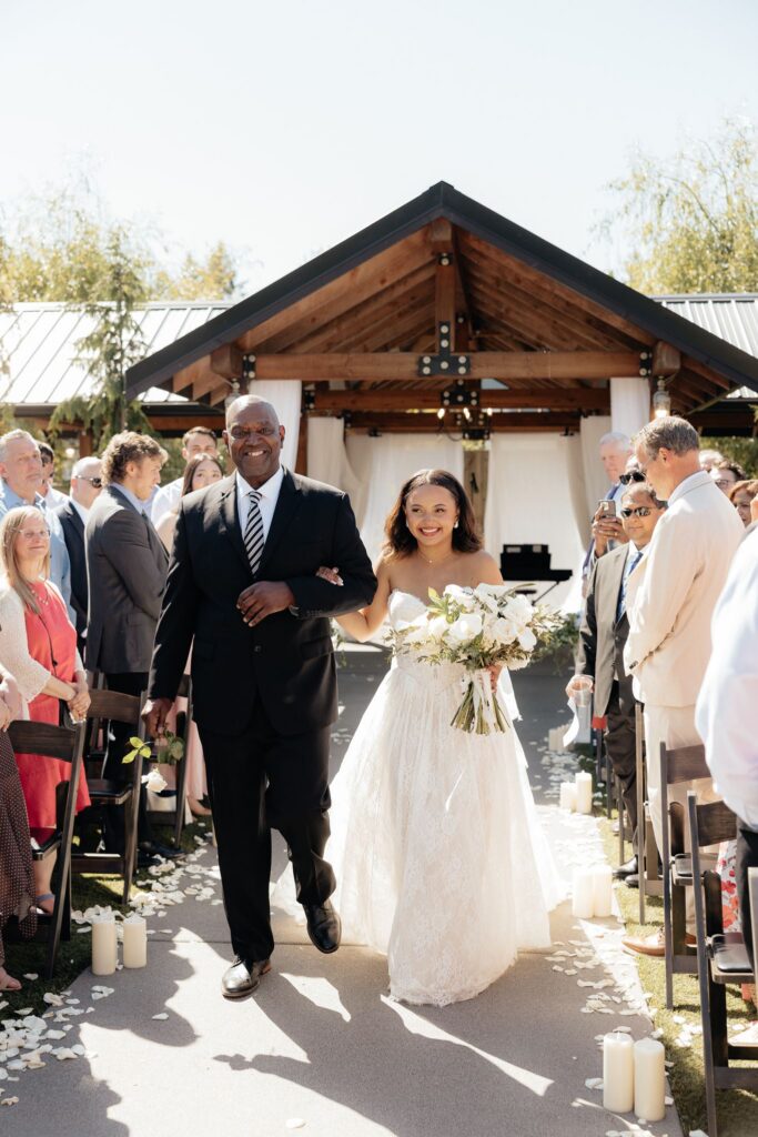 cute picture of the bride walking down the aisle