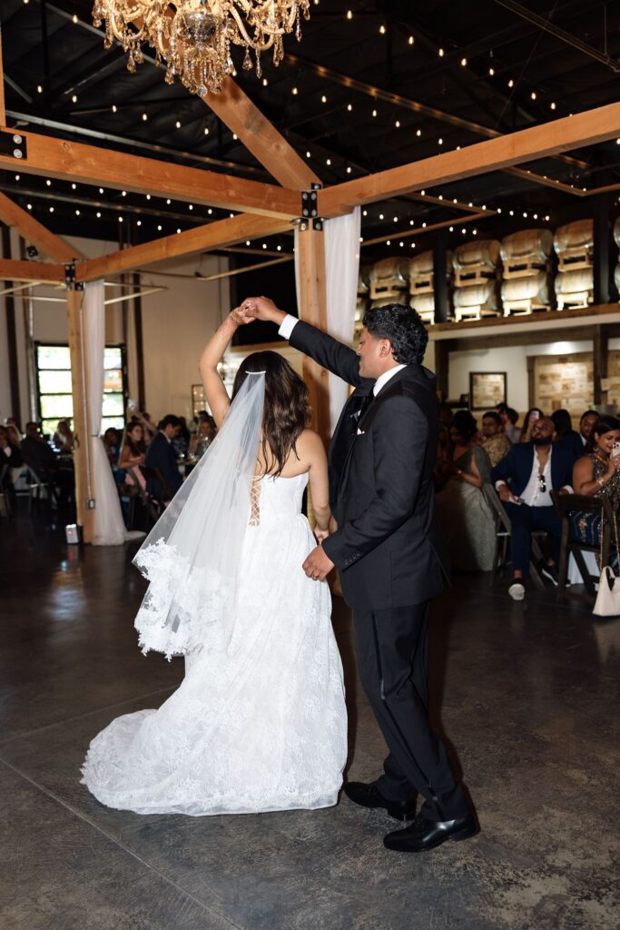 cute picture of the bride and groom dancing