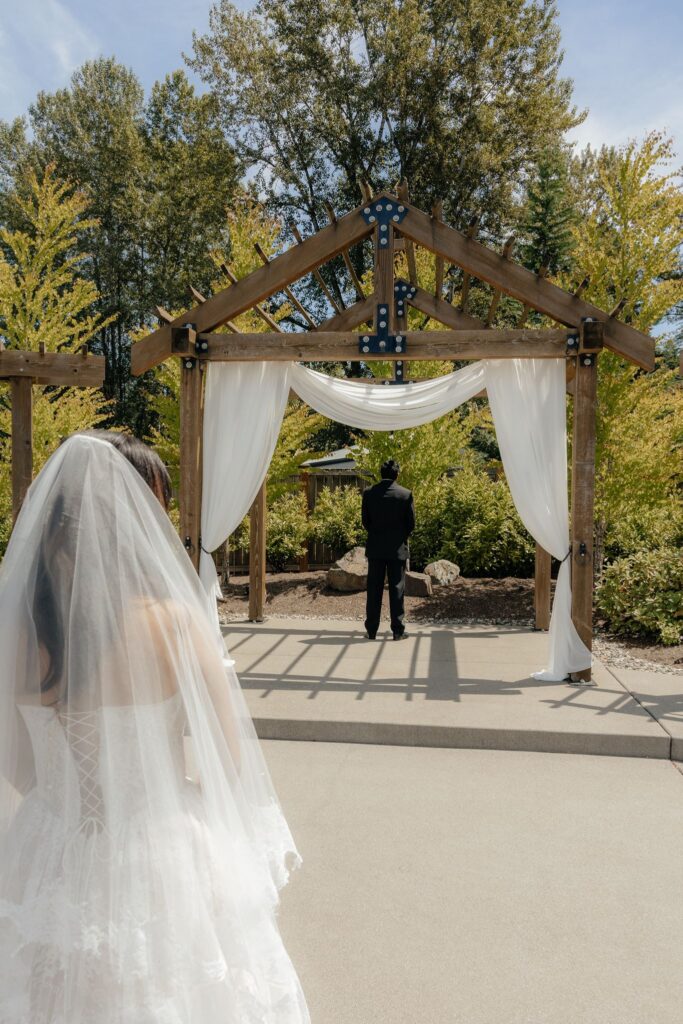 bride and groom at their first look