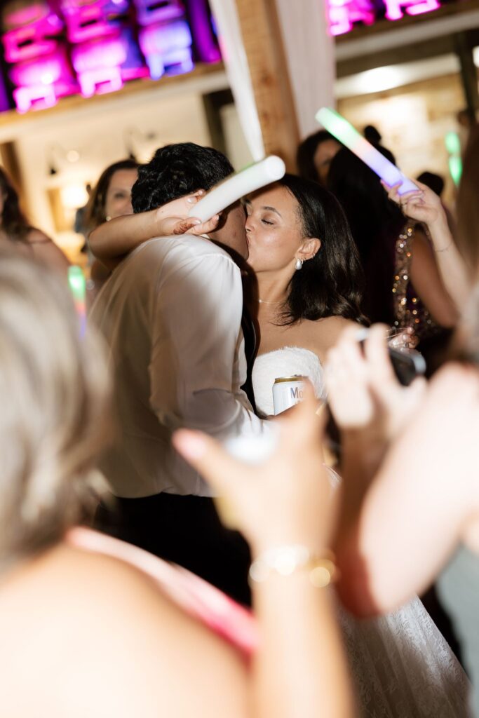 newlyweds at their fun wedding reception party