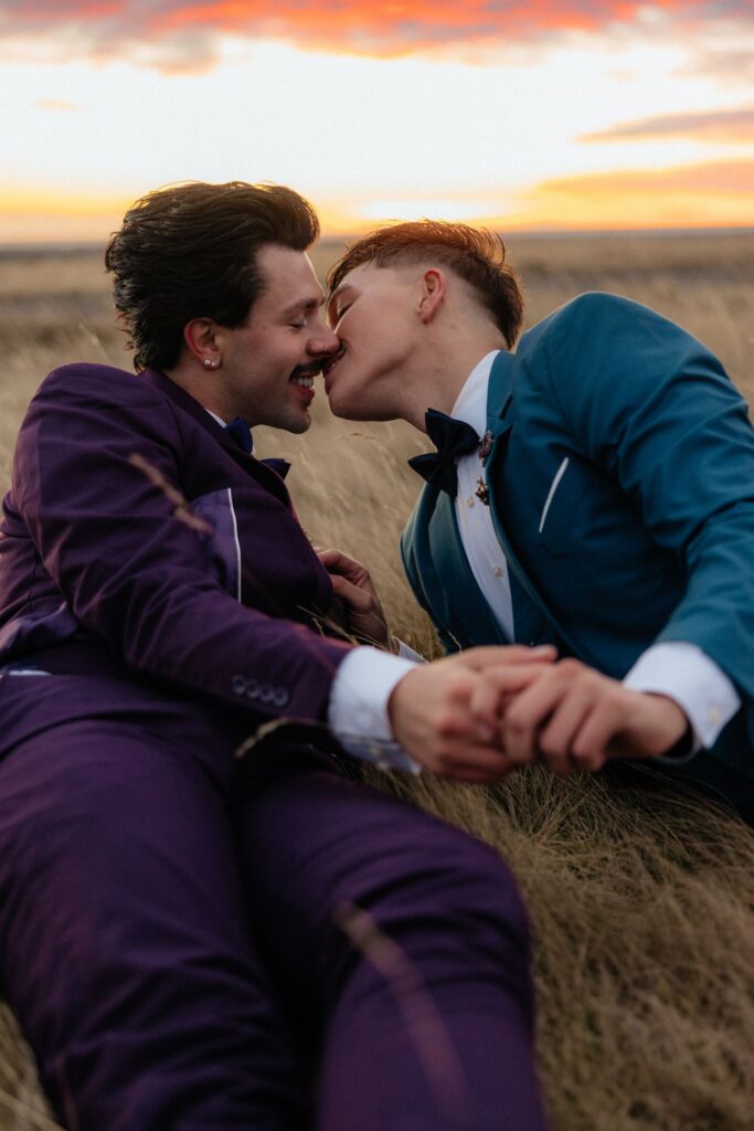 cute picture of the couple kissing during their photoshoot