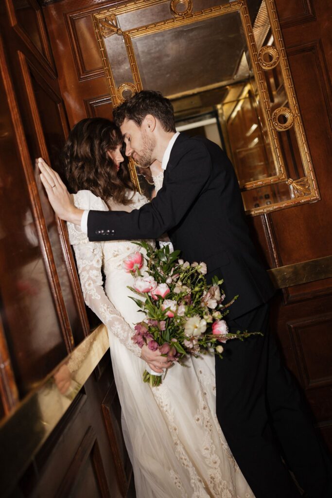 beautiful portrait of the newlyweds kissing