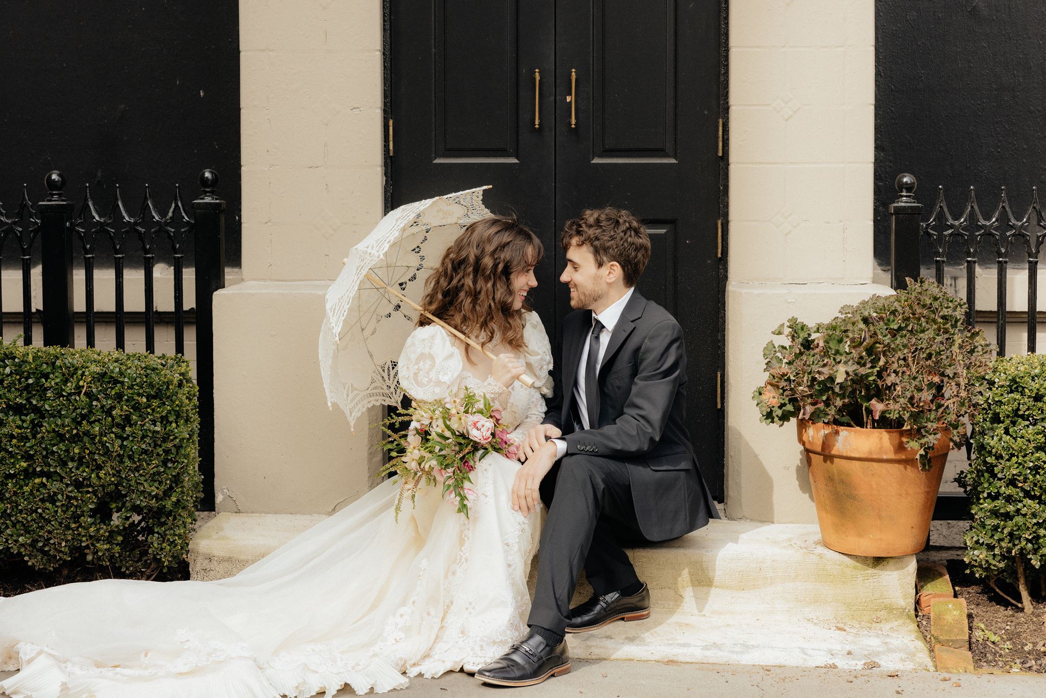 cute picture of the newlyweds laughing with each other