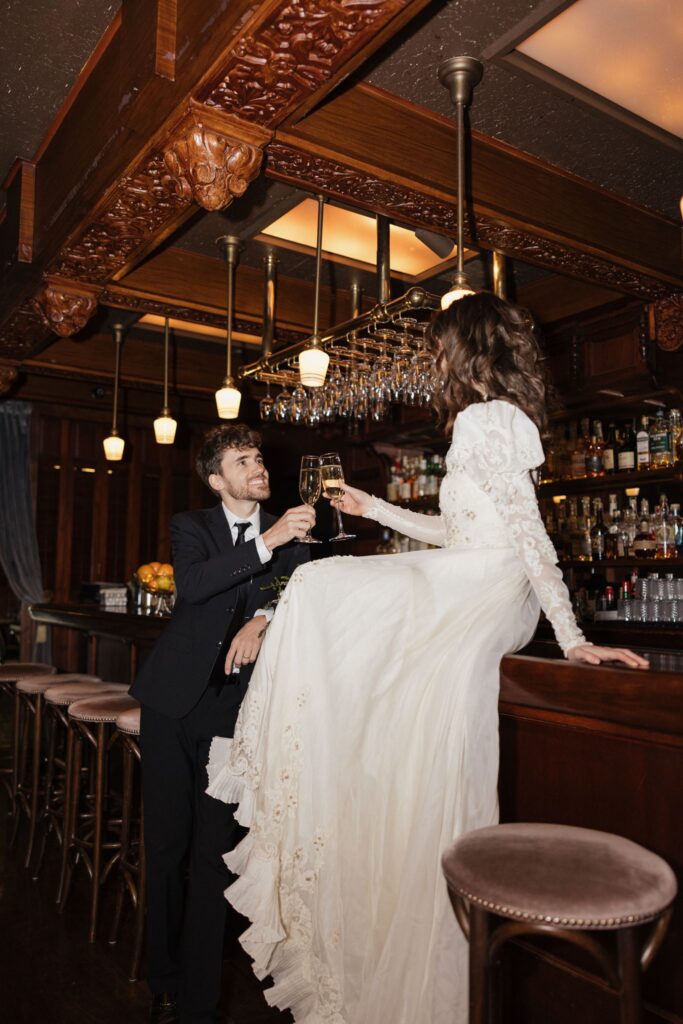 newlyweds celebrating with some drinks