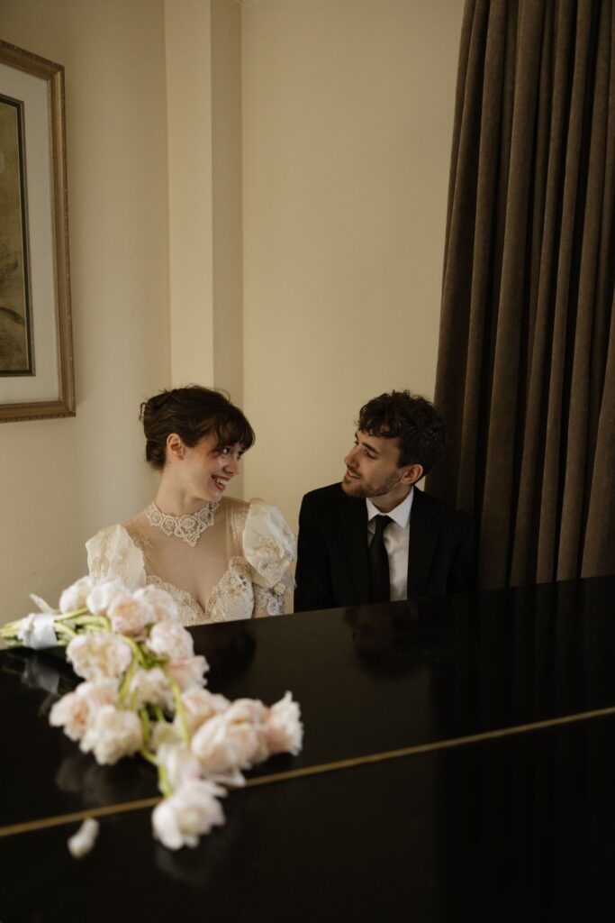 cute picture of the bride and groom smiling at each other