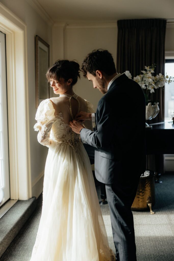 bride and groom getting ready for their wedding ceremony