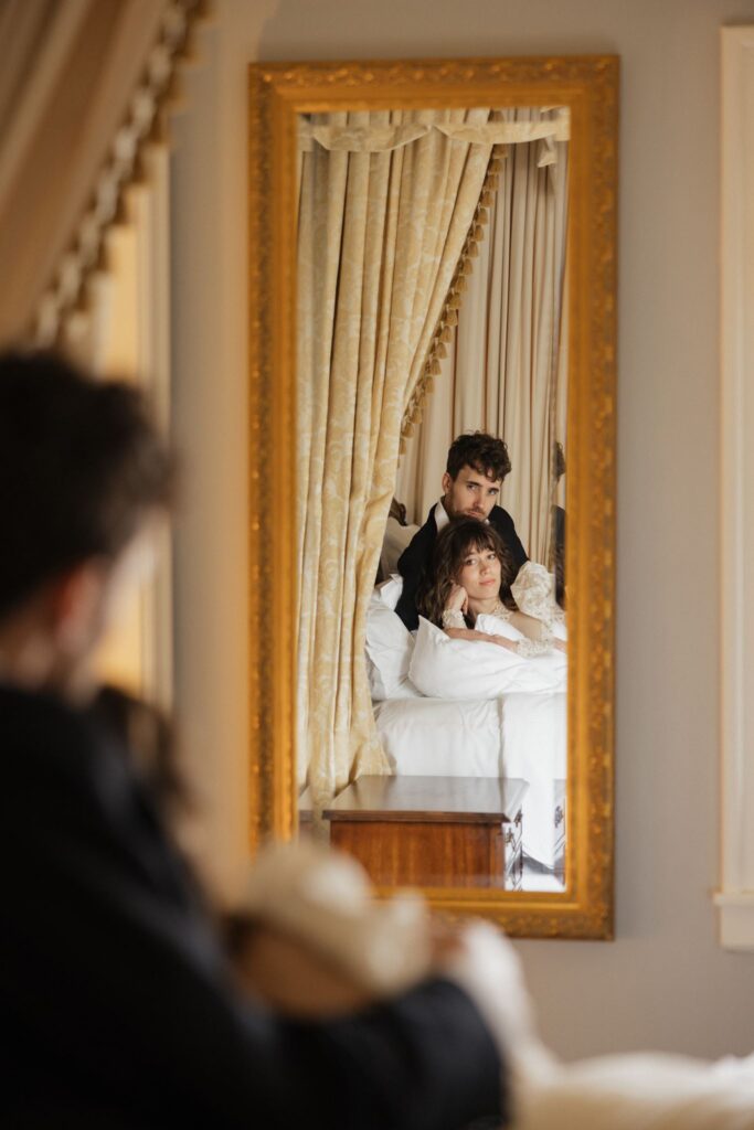 groom kissing the bride on the forehead