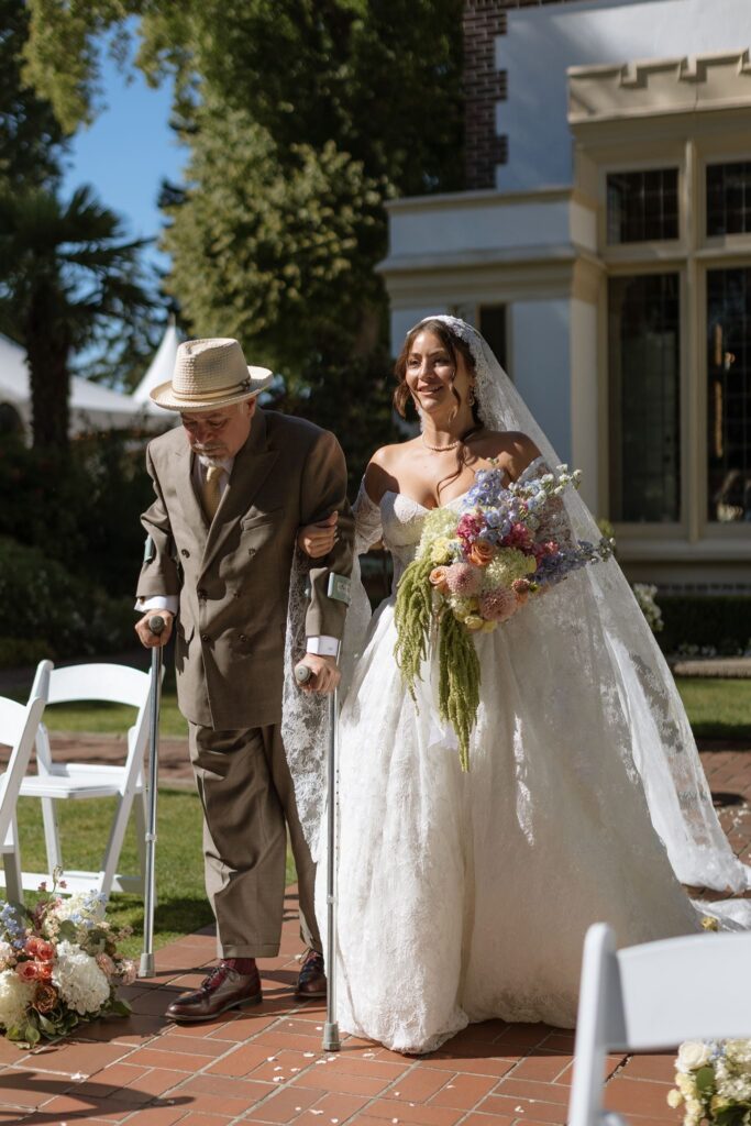 Beautiful portrait of the bride walking down the aisle