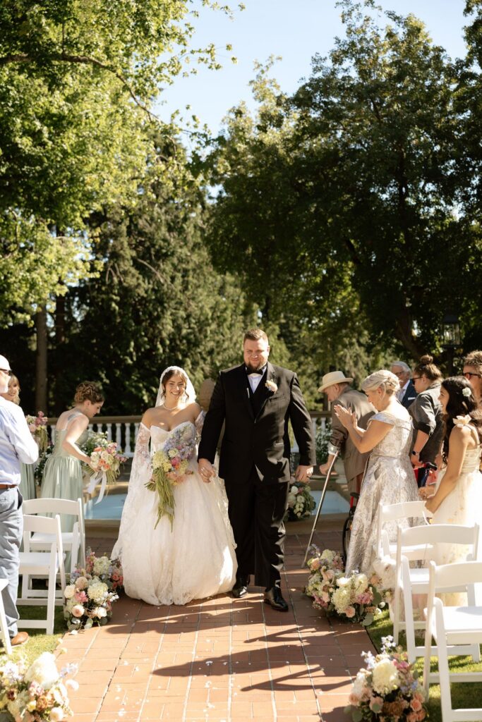 Newlywedsd heading to their wedding reception