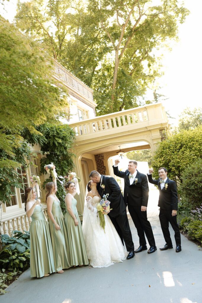 Picture of the newly married couple with their bridal parties