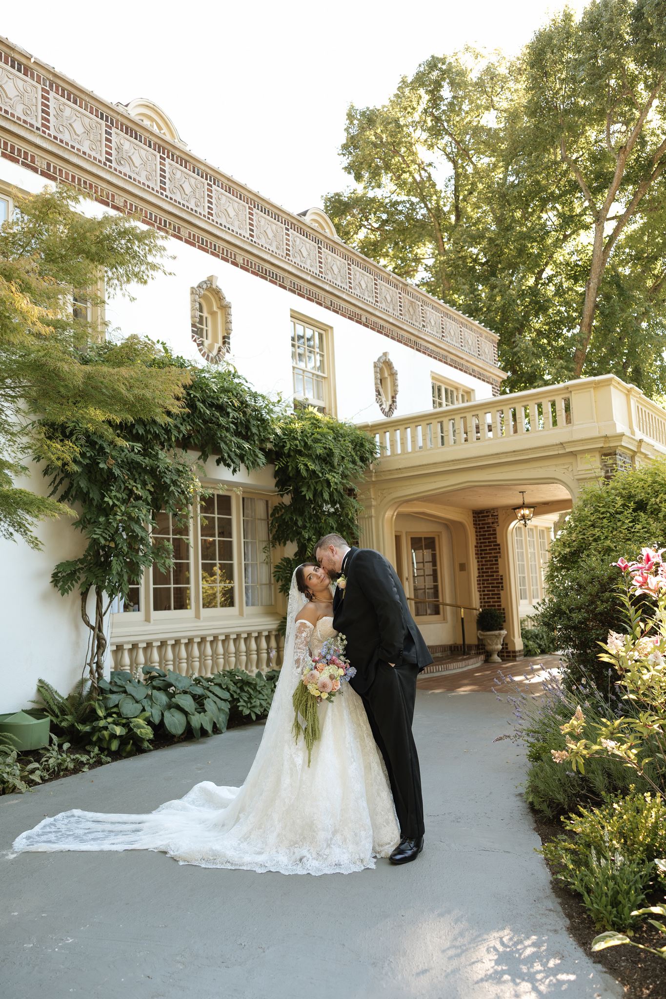 Beautiful picture of the bride and groom, kissing