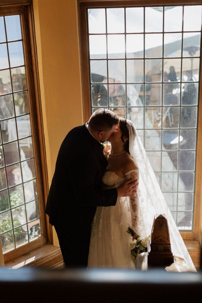 Cute photo of the bride and groom, kissing