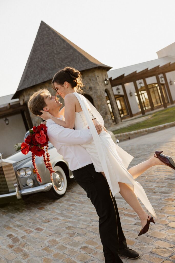 cute picture of the bride and groom laughing with each other