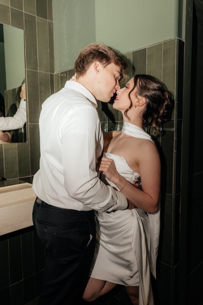 cute picture of the bride and groom kissing