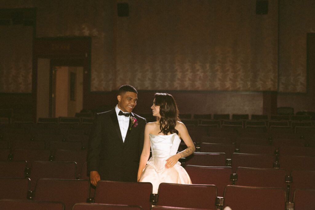 cute picture of the bride and groom smiling at each other