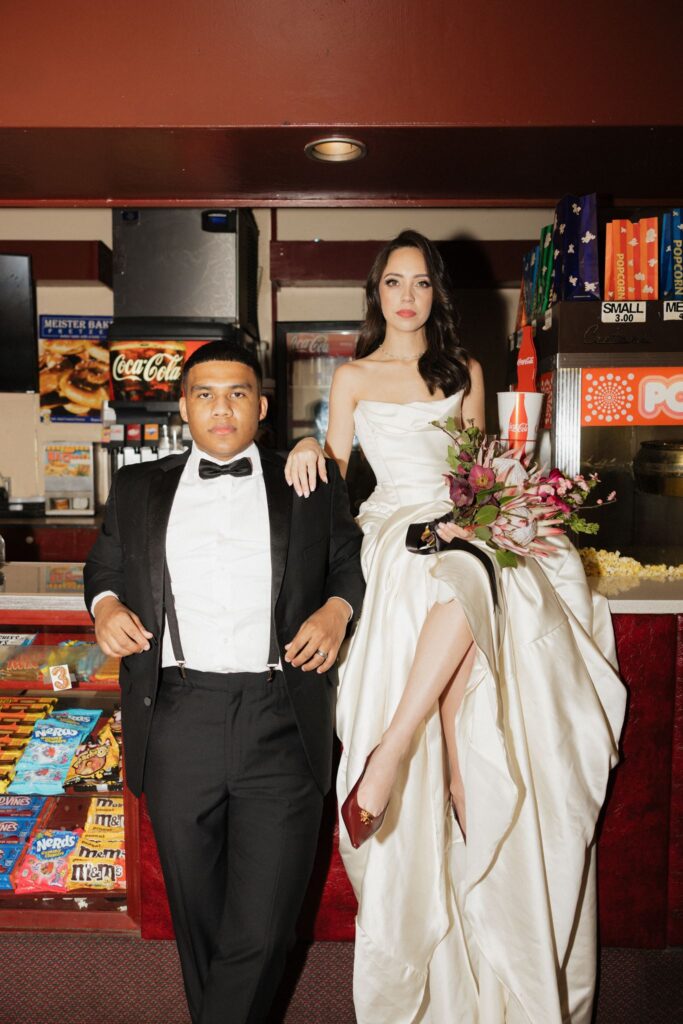 picture of the bride and groom, smiling at the camera during their photo shoot