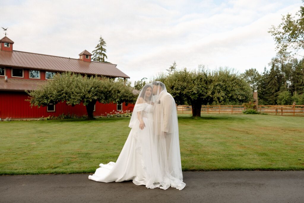 groom kissing the bride on the cheek