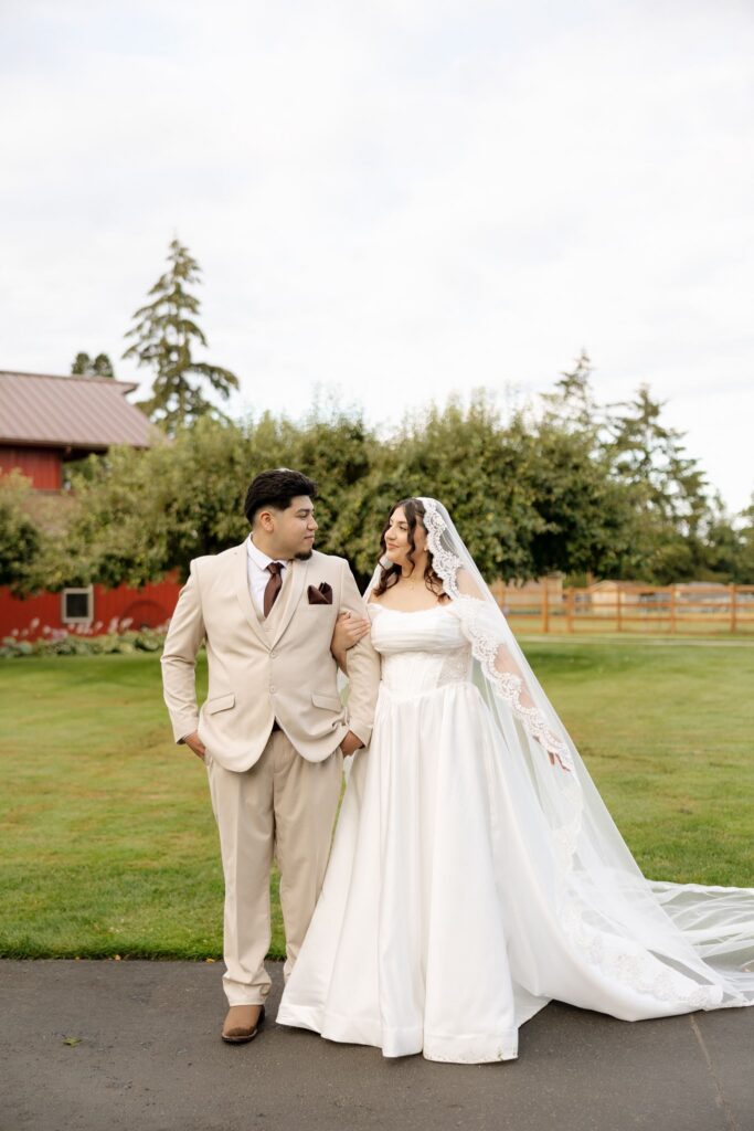 cute picture of the bride and groom smiling at each other